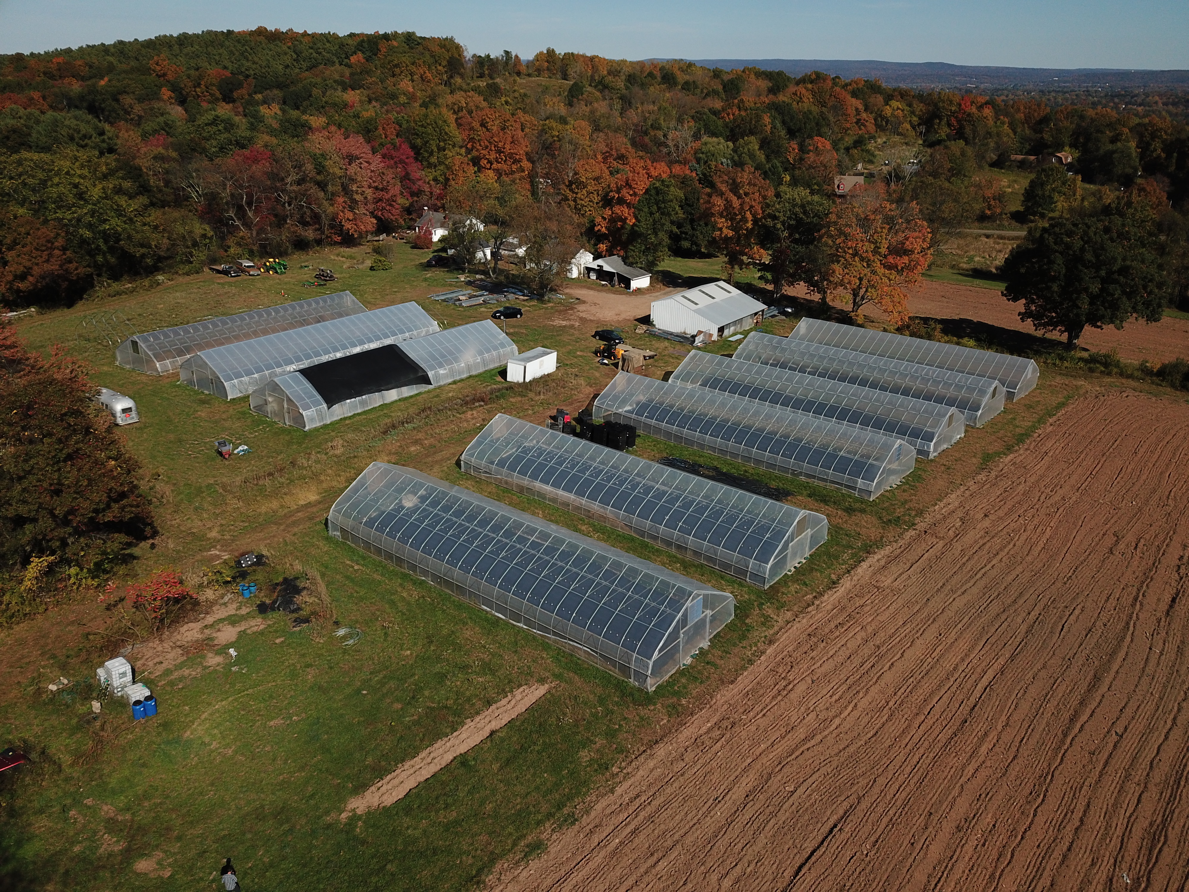 High tunnel installation on a working farm